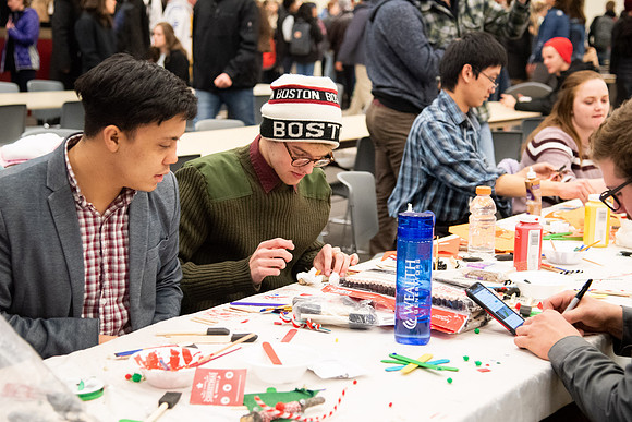 Students decorating cards at the MC