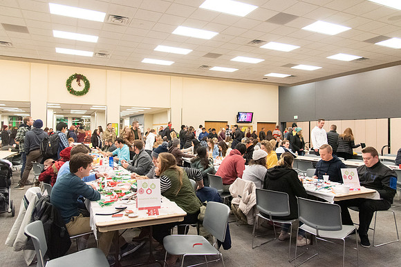 Students decorating cards at the MC