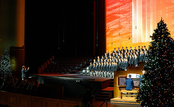 The men's choir perform during devotional held in the BYU-Idaho Center, Fall Semester.