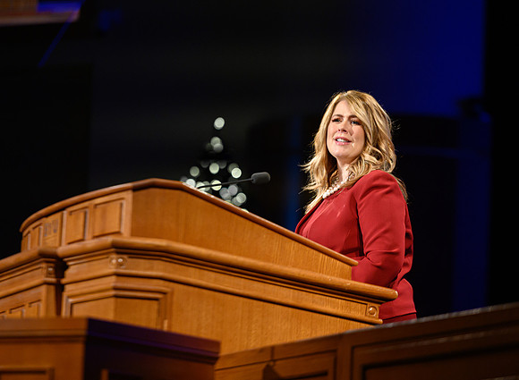 Amy LaBaugh introduces the devotional speaker.