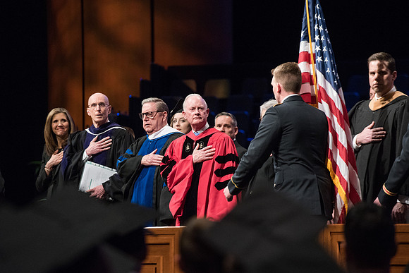 BYU-Idaho Commencement. Guest Speaker Jeffrey R. Holland and Elder Kim B. Clark with BYU-Idaho Officials during the posting of colors. Winter Semester.