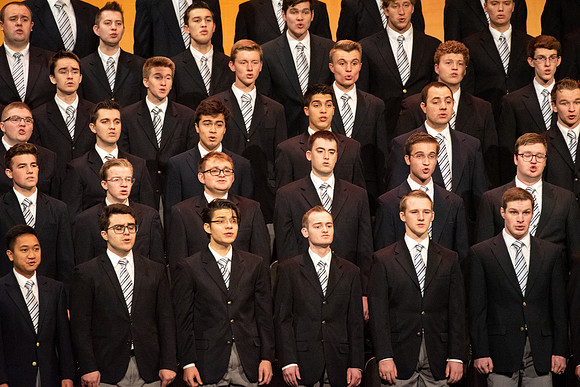Mens choir perfroms at the devotional.