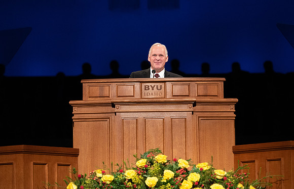 Humanities and Philosophy instructor Brian Merrill speaks at devotional in the BYU-Idaho Center.