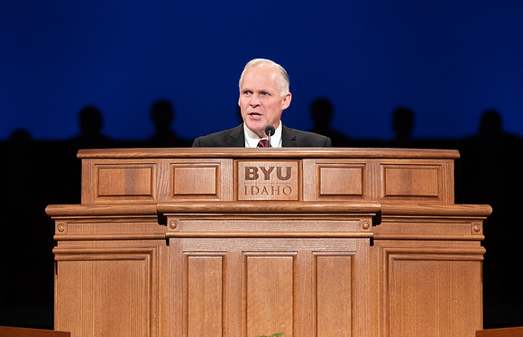 Humanities and Philosophy instructor Brian Merrill speaks at devotional in the BYU-Idaho Center.