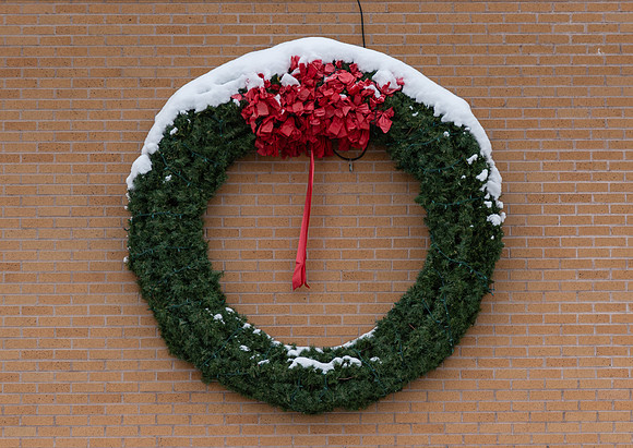 Christmas wreath hanging outside of the Kimball building at BYU-Idaho.