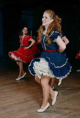 Folk dancers perform.