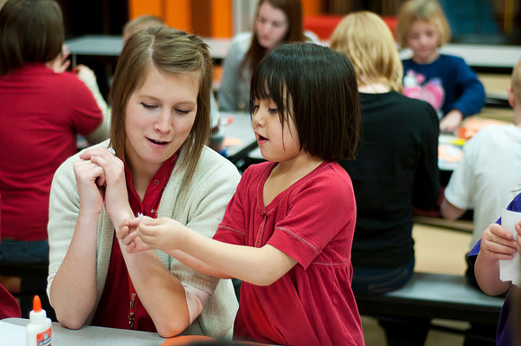 BYU-Idaho student Emily Lee works with Kennedy Elementary kids in an after school program.<br/>student leader contact: Emma Anderson 313-2997<br/>and08004@byui.edu