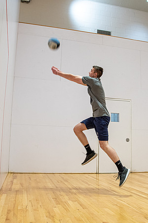 Group of students playing wallyball at BYU-Idaho raqetball courts in the Hart Auditorium building.