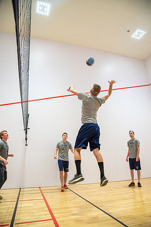 Group of students playing wallyball at BYU-Idaho raqetball courts in the Hart Auditorium building.