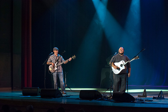 Brigham Young University-Idaho's Center Stage presents the Hawaiian Slack Key Kings. Performers Stephen Inglis, Patrick Landeza, Hear LT Smooth created a warm Hawaiian atmosphere with their music amid