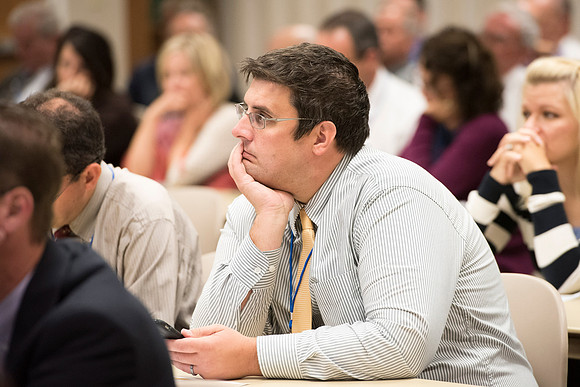 Faculty members come together in preparation of the new school year.