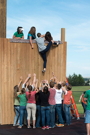 Youth high enjoy the Ropes Course class.