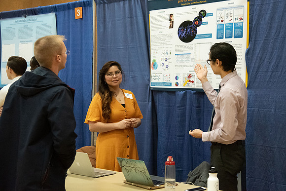 Students present projects at Research and Creative Works conference.