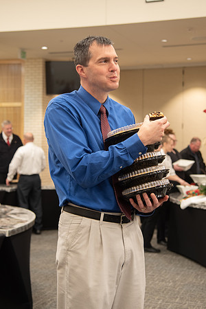 Employees come to get a pie from President Eyring and President's Executive Group.