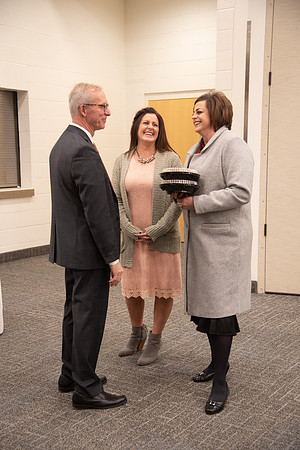 Employees socializing at the Employee Christmas Pie Social.