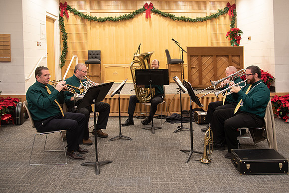 Entertainment at the Employee Christmas Pie Social. Brass band playing Christmas songs.