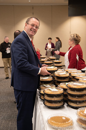 Employees come to get a pie from President Eyring and President's Executive Group.
