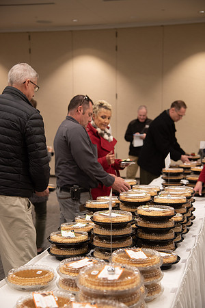 Employees come to get a pie from President Eyring and President's Executive Group.