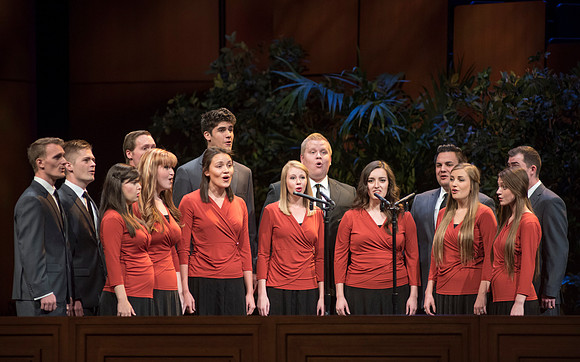 A choir sings at devotional.