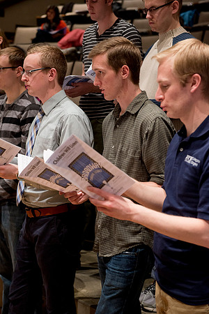 Students sing under the direction of Brother Randall Kempton in the Collegiate Singers ensemble.