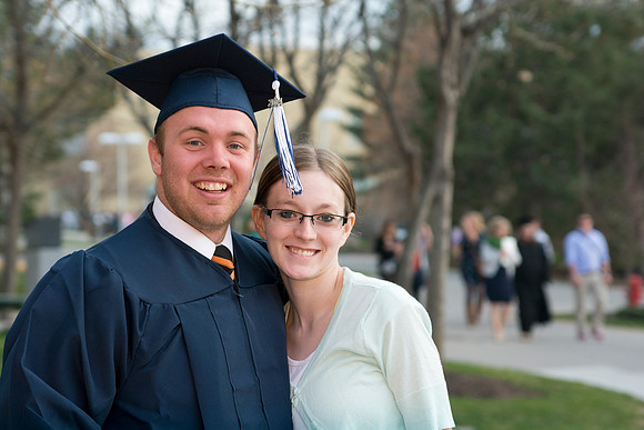 Brigham Young University-Idaho Graduates tour campus with their families saying goobyes to peers and getting pictures with friends and family before the convocation ceremonies. Photo by Ryan Chase