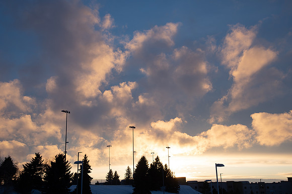 Clouds around BYU-Idaho campus during a winter sunset.