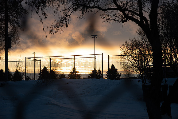 Clouds around BYU-Idaho campus during a winter sunset.