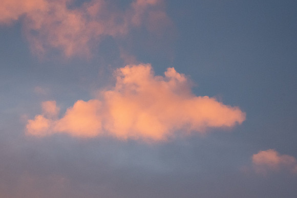 Clouds around BYU-Idaho campus during a winter sunset.