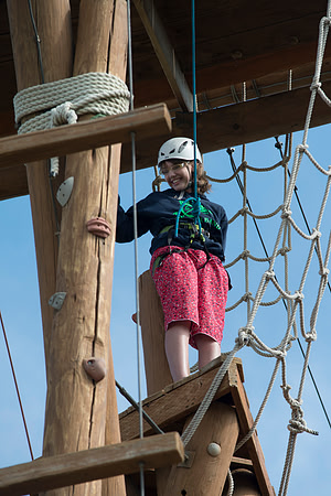 Youth high enjoy the Ropes Course class.