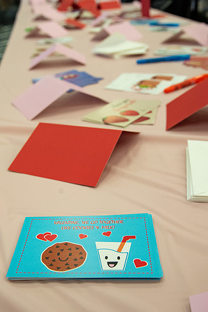 Students decorate sugar cookies and valentine cards in the MC on Valentine's Day.