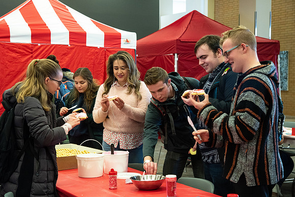 Students decorate sugar cookies and valentine cards in the MC on Valentine's Day.