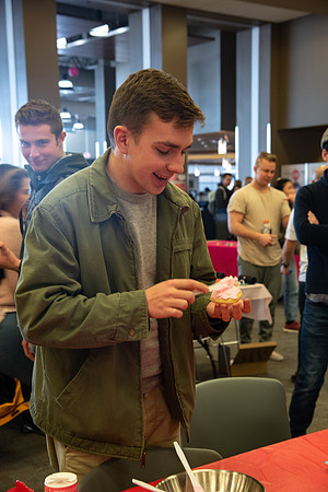 Students decorate sugar cookies and valentine cards in the MC on Valentine's Day.