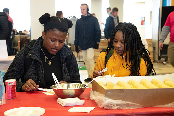 Students decorate sugar cookies and valentine cards in the MC on Valentine's Day.