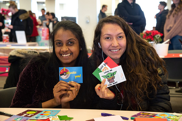 Students decorate sugar cookies and valentine cards in the MC on Valentine's Day.
