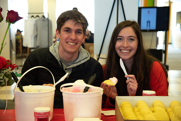 Students decorate sugar cookies and valentine cards in the MC on Valentine's Day.