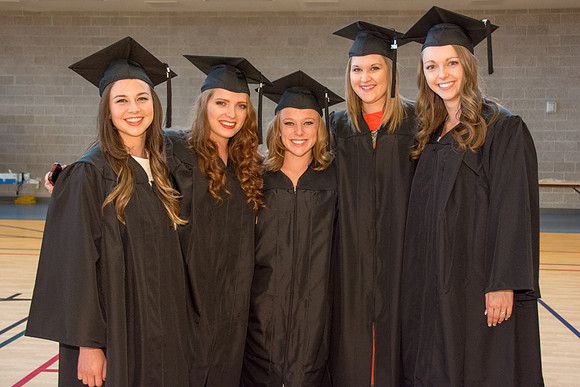 Students await commencement ceremony held in the BYU-Idaho Center.