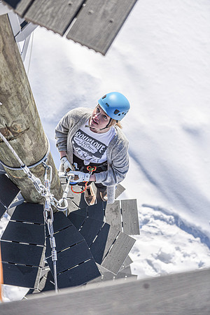 Students explore the new ropes course which includes multiple suspended obstacles as well as a ziplines course.