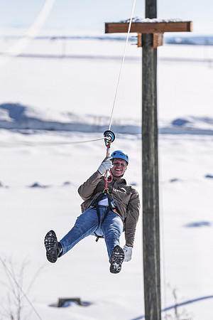 Students explore the new ropes course which includes multiple suspended obstacles as well as a ziplines course.