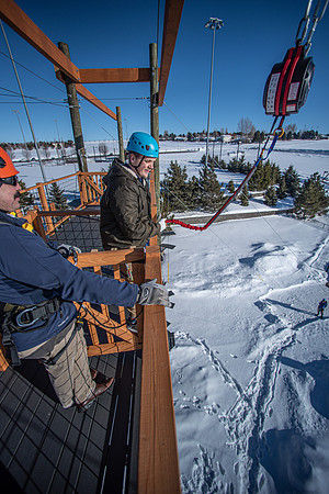 Students explore the new ropes course which includes multiple suspended obstacles as well as a ziplines course.
