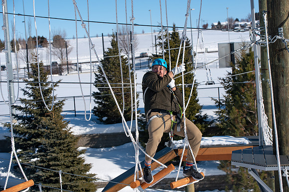 Students try out the new ropes course and zipline at BYU-Idaho.