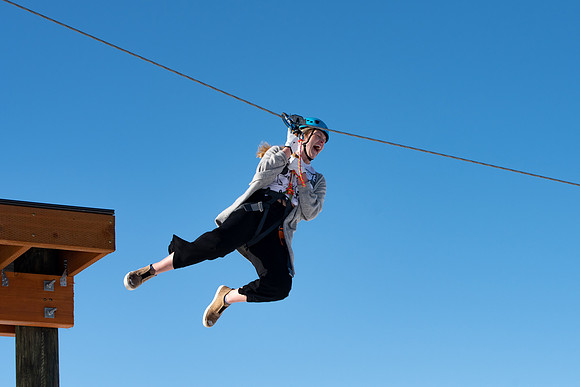 Students try out the new ropes course and zipline at BYU-Idaho.