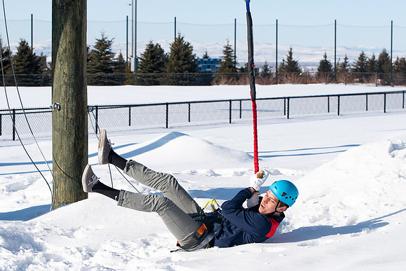 Students try out the new ropes course and zipline at BYU-Idaho.