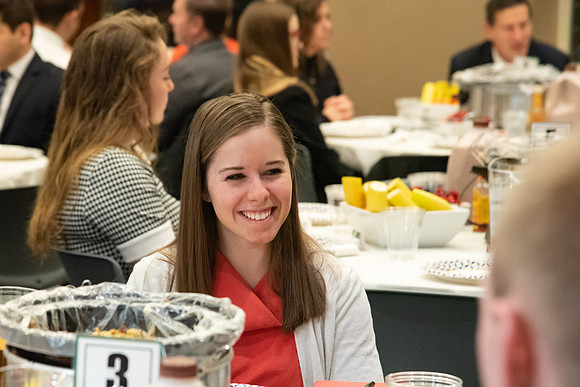 Faculty and staff of Housing and Student Living gather for an early morning breakfast and inspiration.