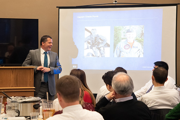 Faculty and staff of Housing and Student Living gather for an early morning breakfast and inspiration.