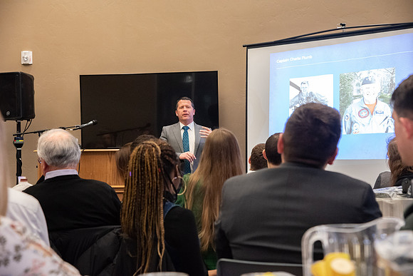 Faculty and staff of Housing and Student Living gather for an early morning breakfast and inspiration.