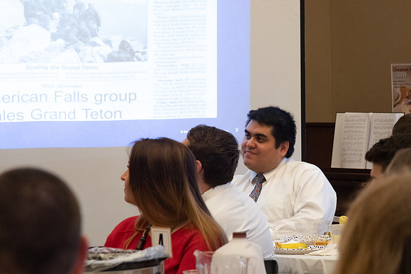 Faculty and staff of Housing and Student Living gather for an early morning breakfast and inspiration.
