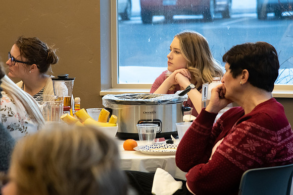 Faculty and staff of Housing and Student Living gather for an early morning breakfast and inspiration.