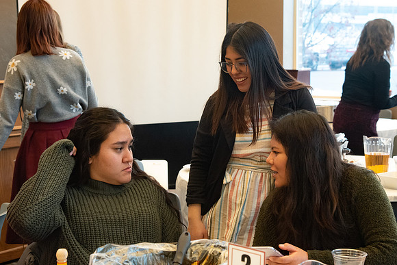 Faculty and staff of Housing and Student Living gather for an early morning breakfast and inspiration.
