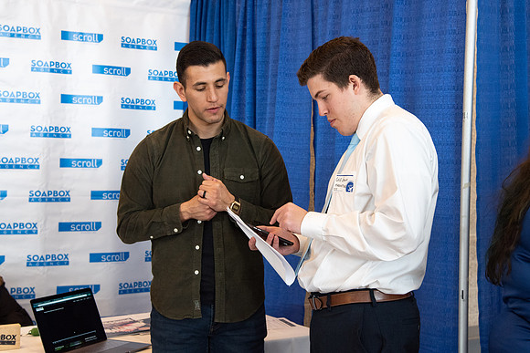 Students meet with different businesses for potential internships and jobs at a career fair at BYU-Idaho.
