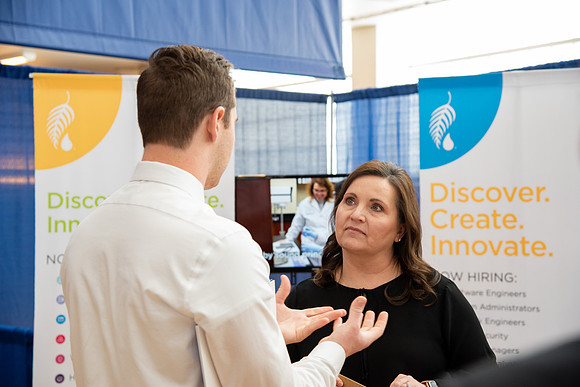 Students meet with different businesses for potential internships and jobs at a career fair at BYU-Idaho.